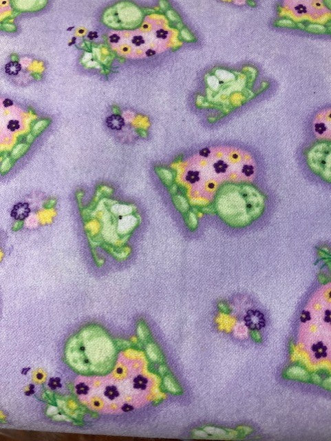 N-0977 $14.50/yd Comfy Flannel with Green Turtles on Purple