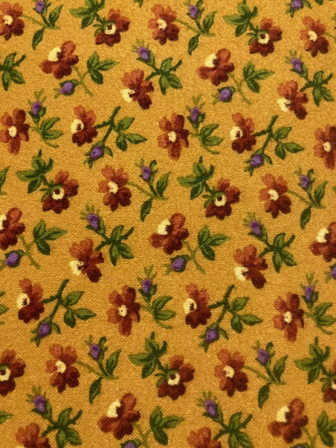 R3823-gold $18.45/YD Gold flannel with burnt orange flowers